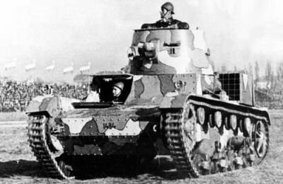 Polish Vickers mark E in an old camouflage scheme.